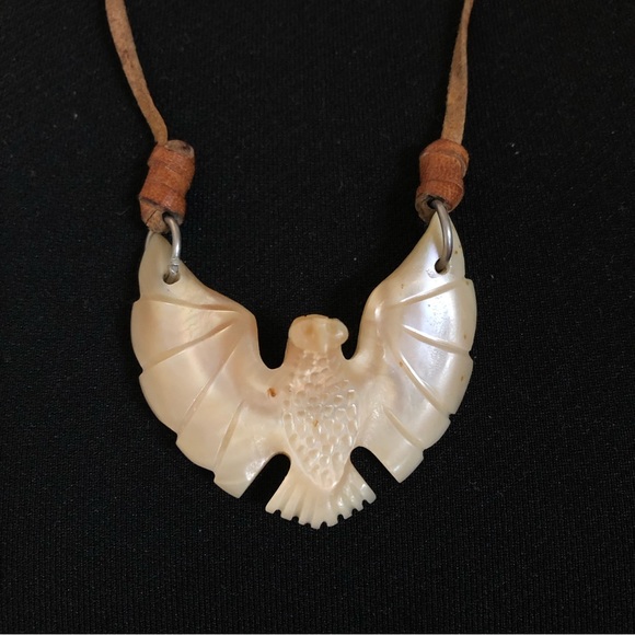 Jewelry - Vintage hand carved eagle on leather necklace